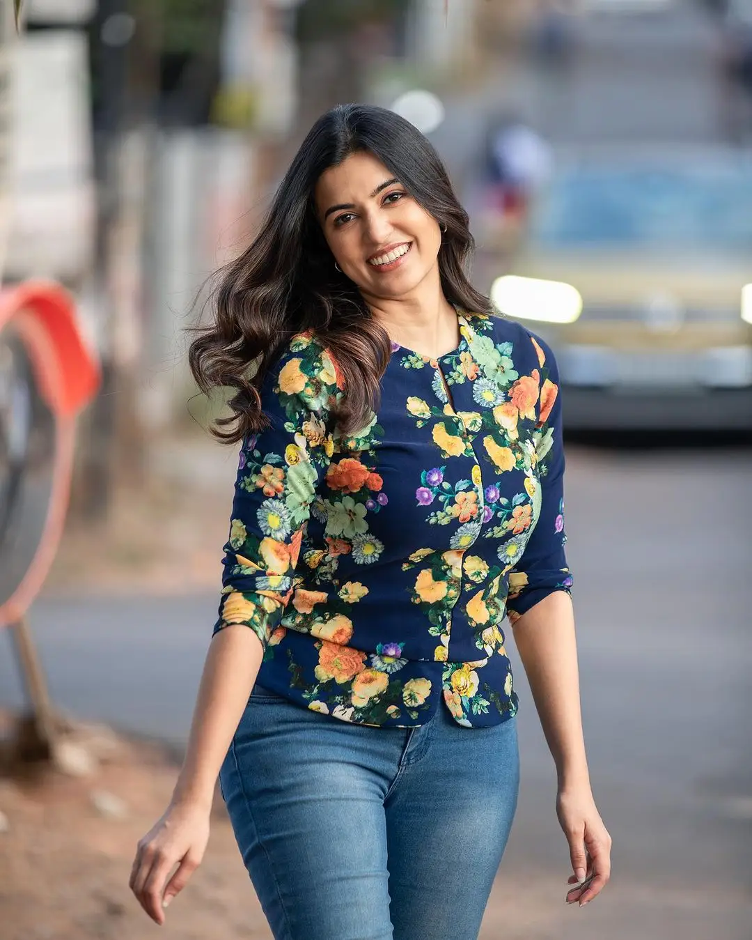 Malayalam Actress Anju Kurian Stills in Black Shirt Blue Pant